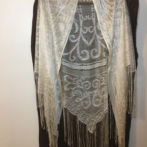 Cream colored lace shawl with fringe